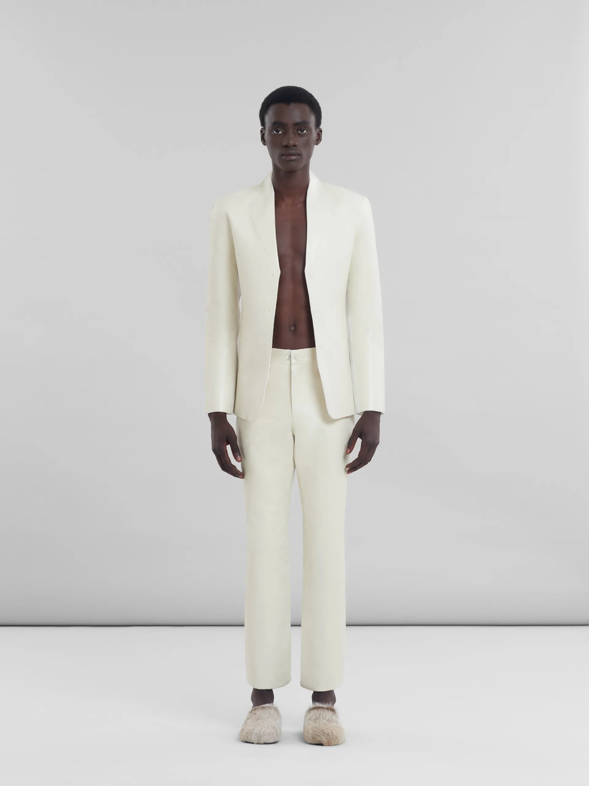 Pantalones con cinco bolsillos de lana blanca y tejido recubierto